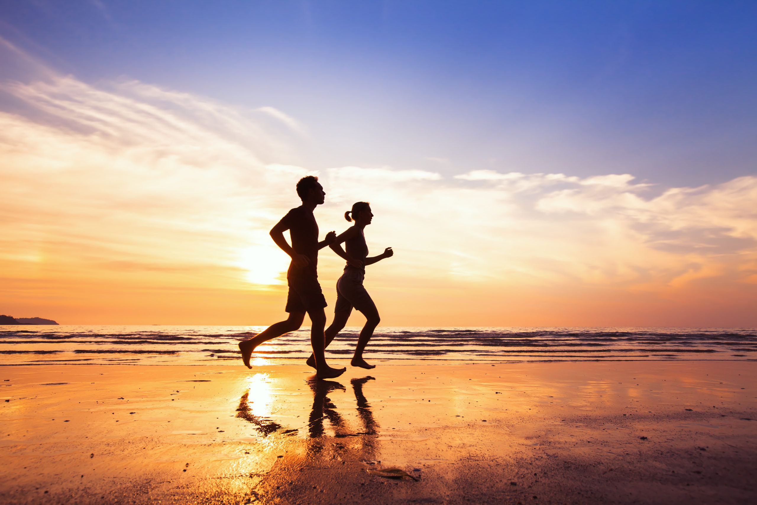 Couple Running During Sunrise